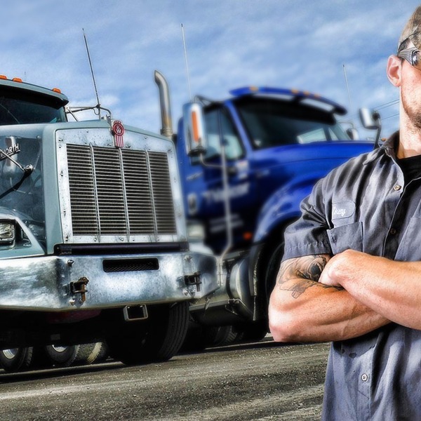 Trucker Man showing off trucks