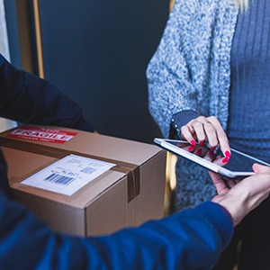 Woman receiving Courier Package