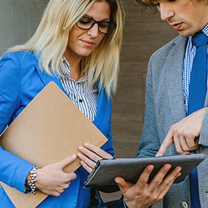 Man showing client papers