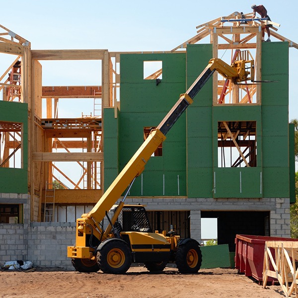 Heavy machine equipment in construction of house