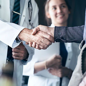 Doctor and Patient shaking hands