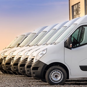 Row of delivery van cars