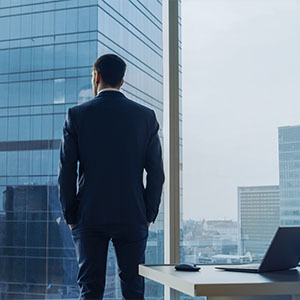 Employee looking out of office